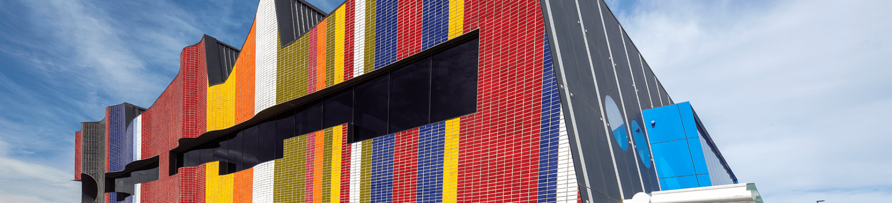 Springvale Community Hub Coloured Facade with people